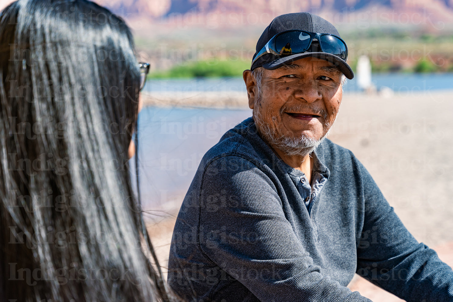 Native Elder enjoying a walk by a lake