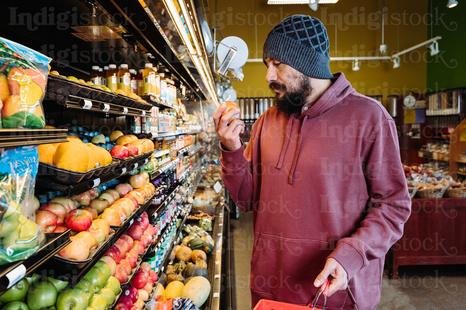 Indigenous man grocery shopping