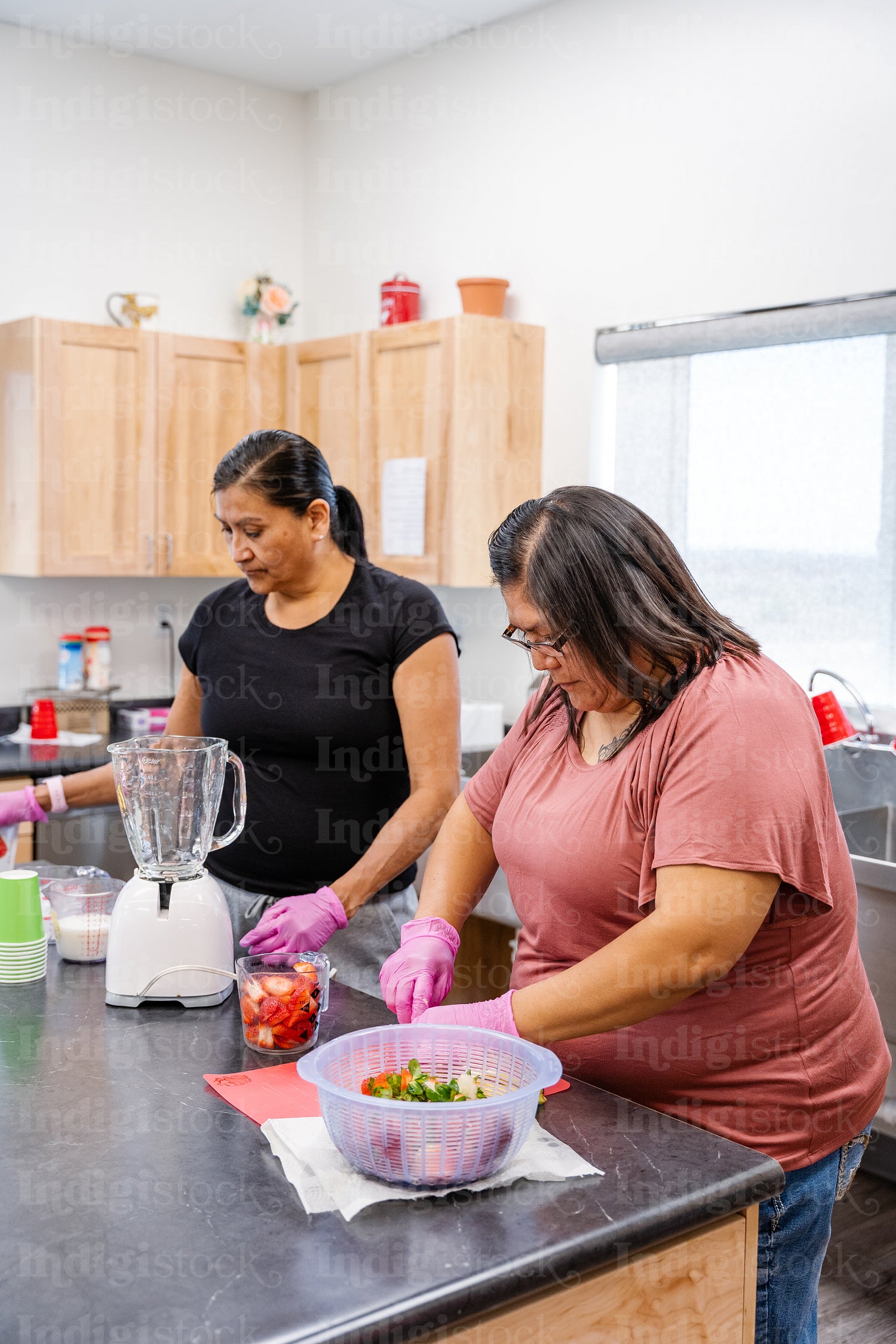 Native Peoples participating in a cooking class