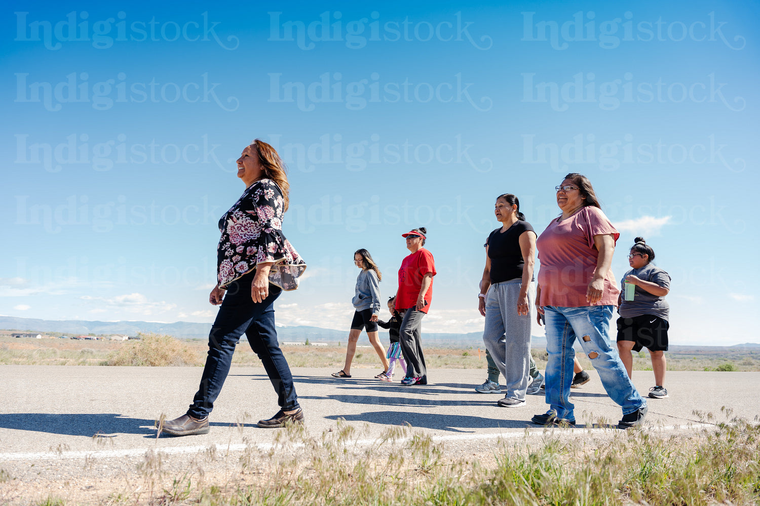 A Native family going on a walk outside 