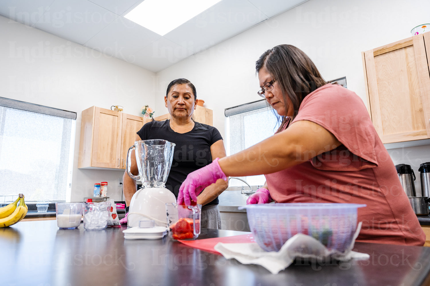 Native Peoples participating in a cooking class