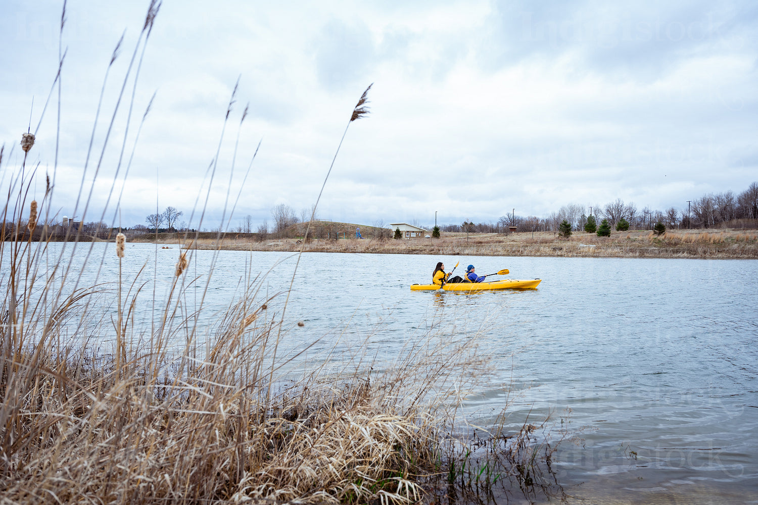 Indigenous family going kayaking 