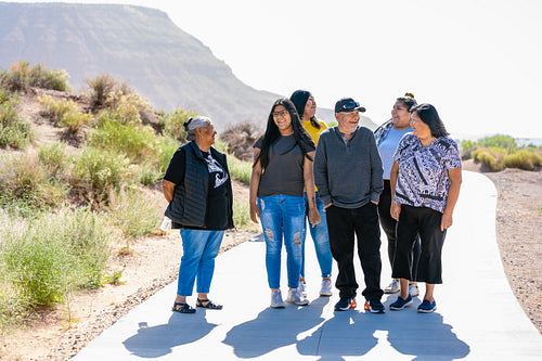 A Native family walking together