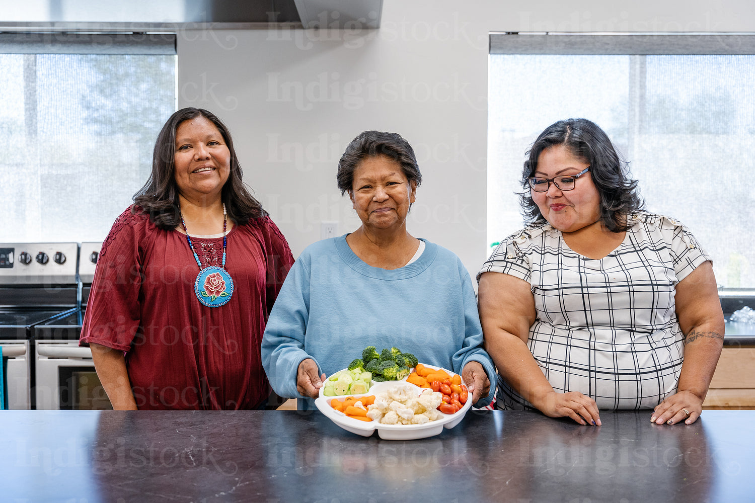 Native Peoples participating in a cooking class