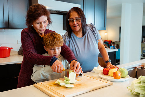 A Native family is preparing a meal together