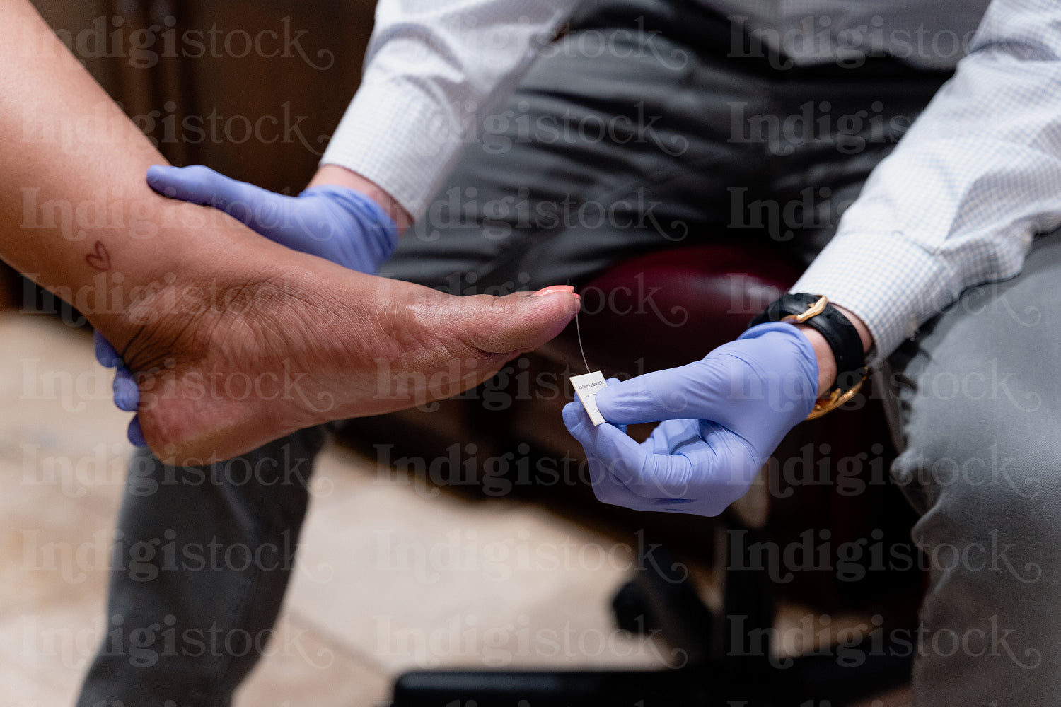 A native woman being seen by a doctor at a health clinic