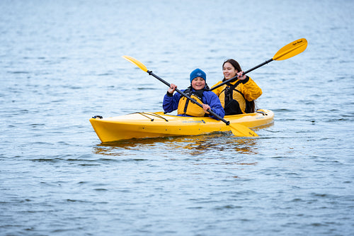 Indigenous family going kayaking