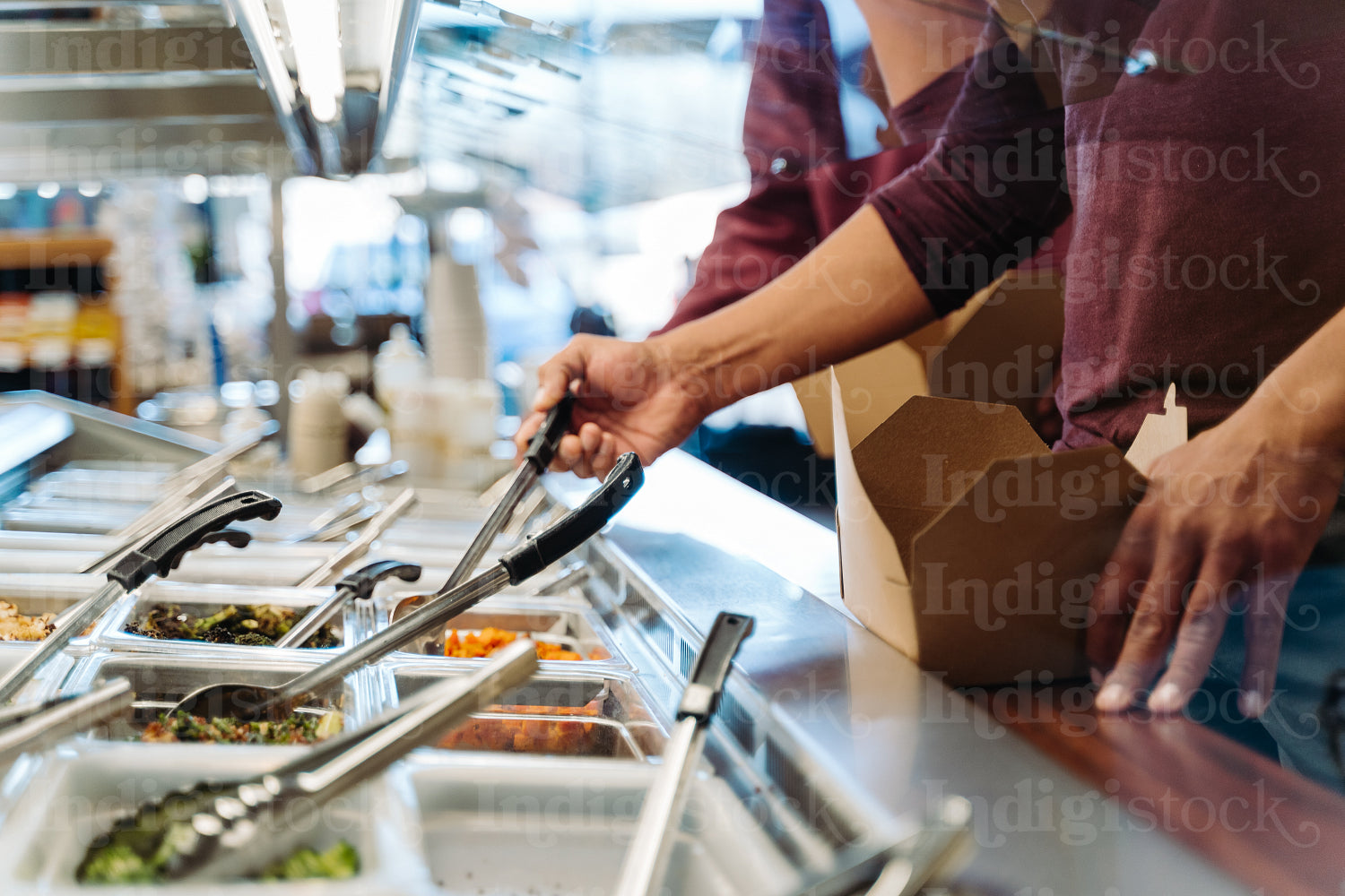 Indigenous man getting food