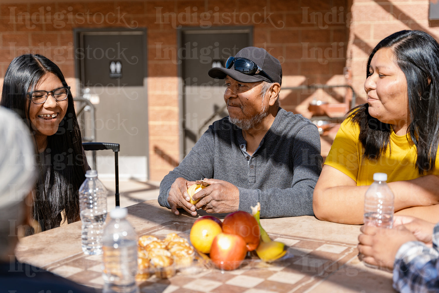 Indigenous family enjoying a park outside togather