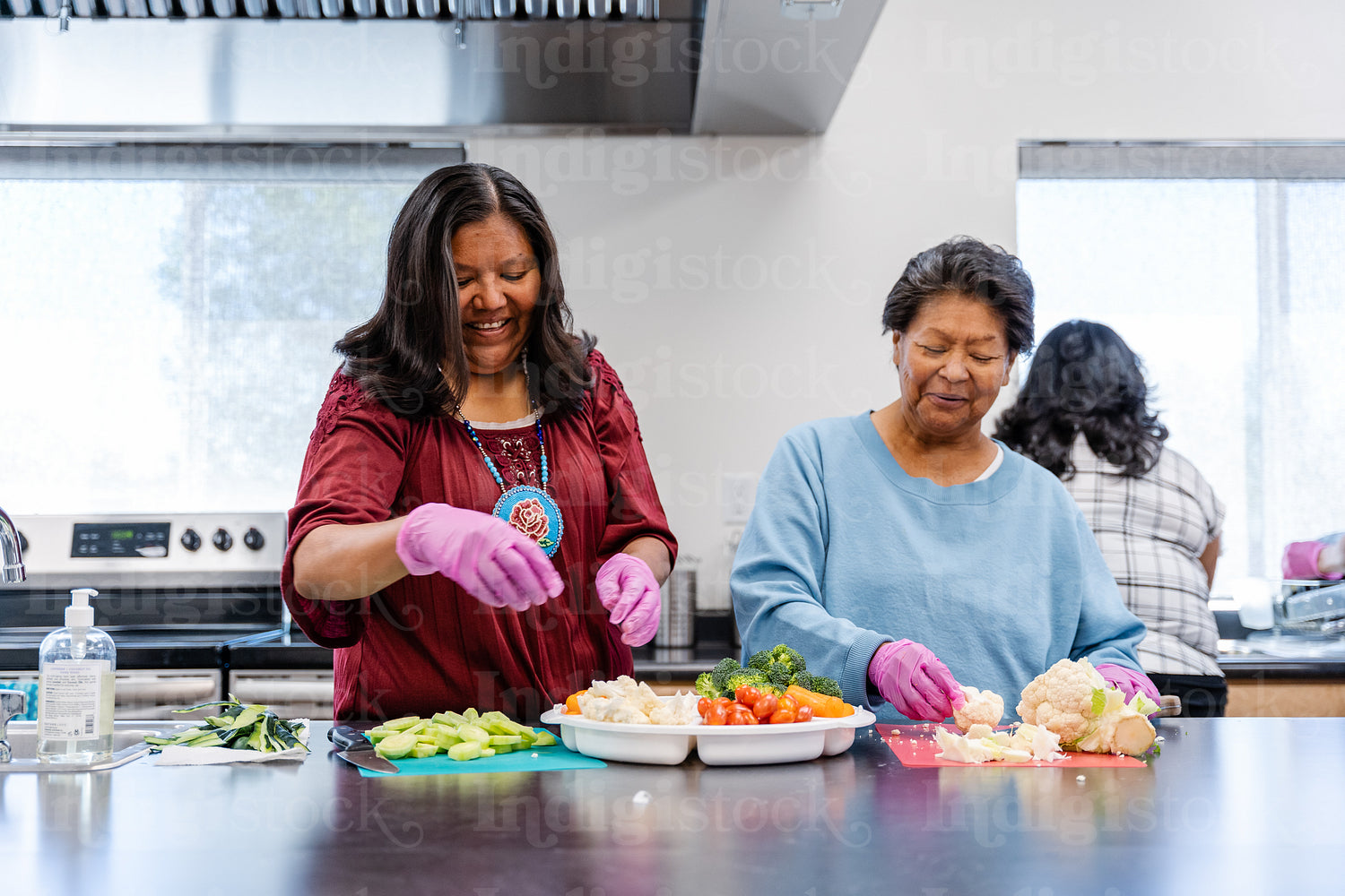 Native Peoples participating in a cooking class