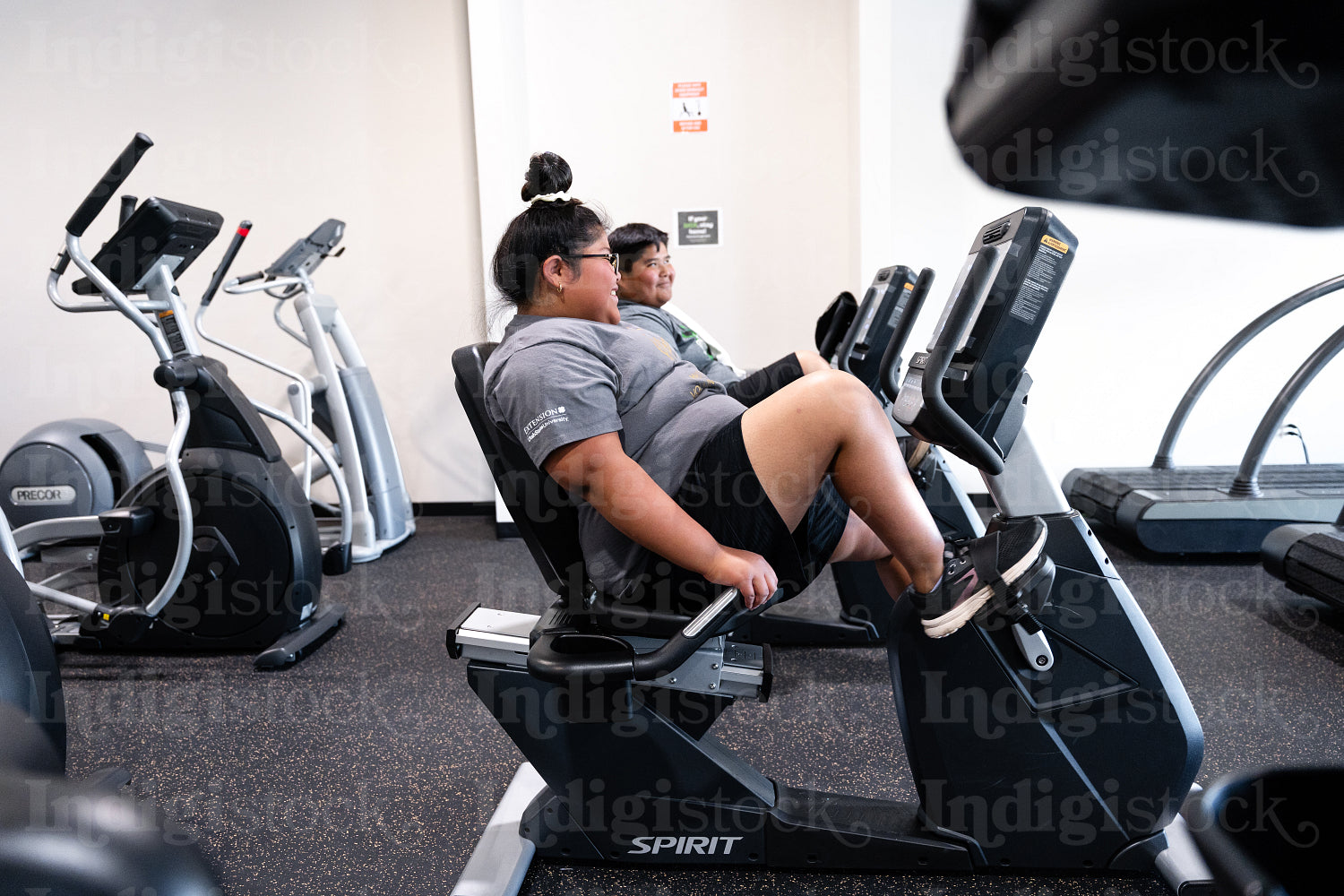 Native youths excercising in a gym