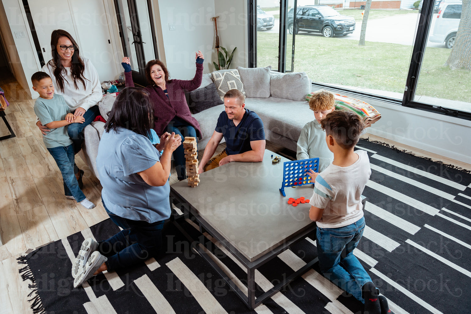 A family of Indigenous Peoples playing games together