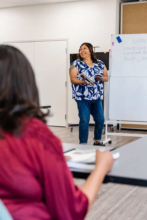 A native teacher instructing a class about health and wellness