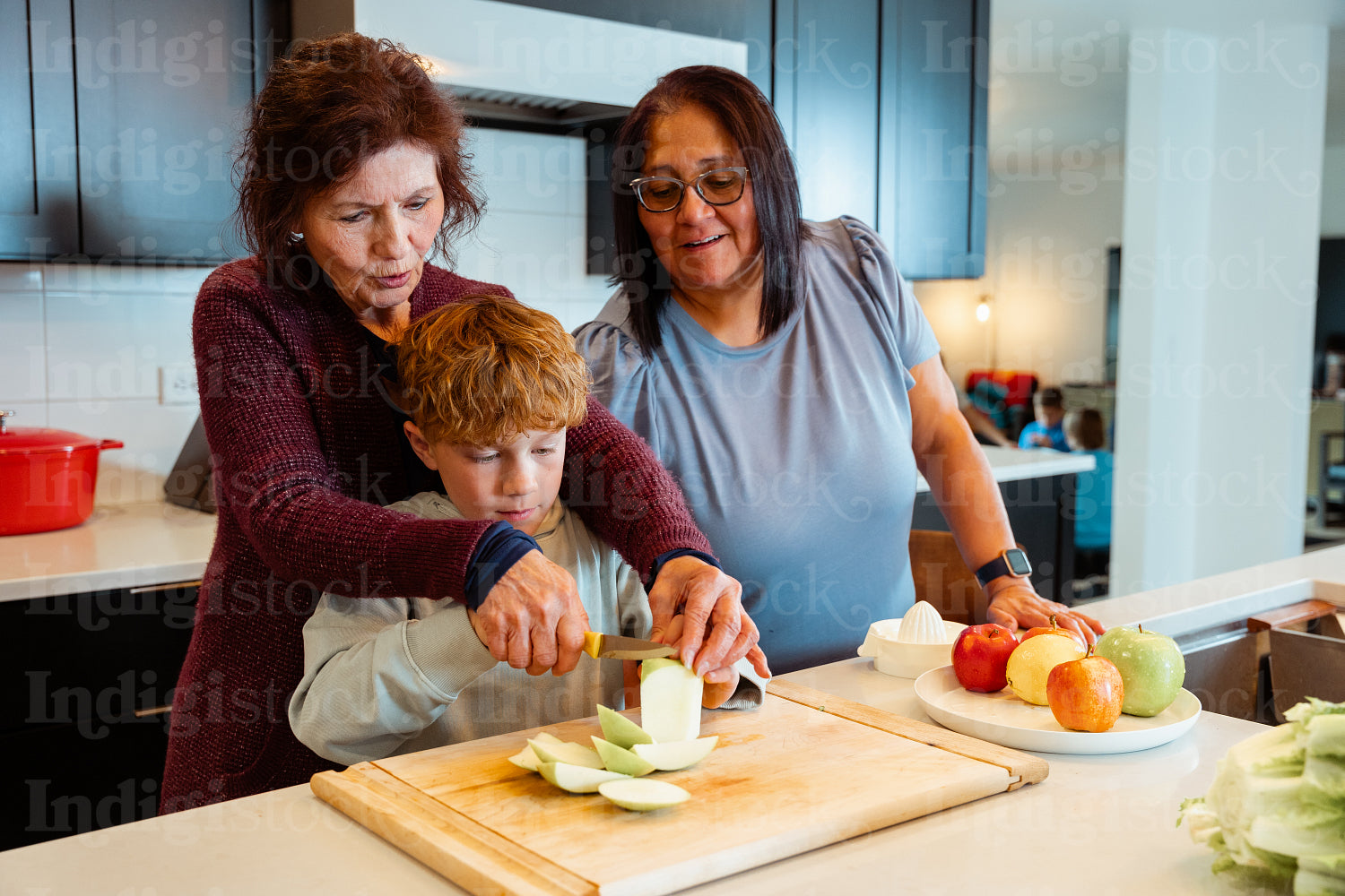 A Native family is preparing a meal together