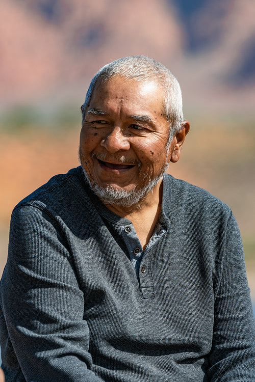 Native Elder enjoying a walk by a lake