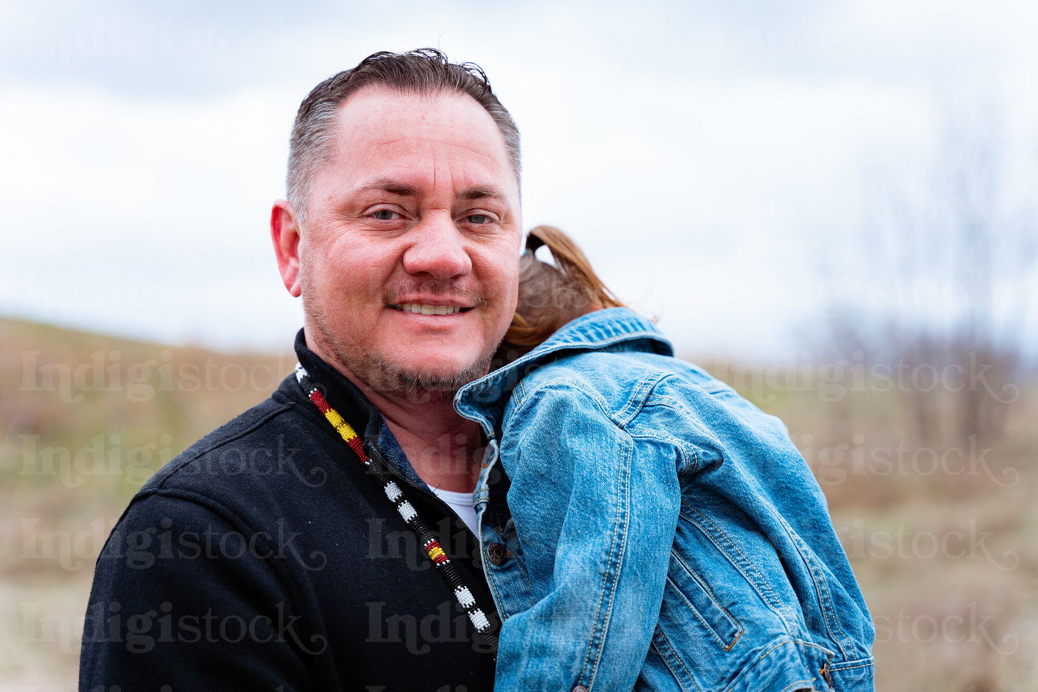 A father and daughter on a walk