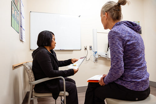 A native elder getting a health checkup at a health center