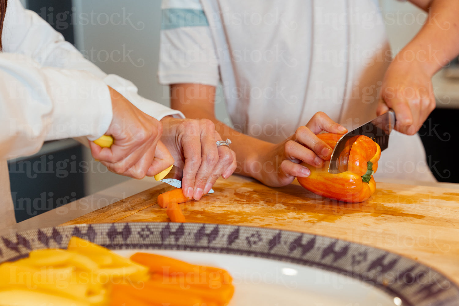 A mother teaching her child how to cook