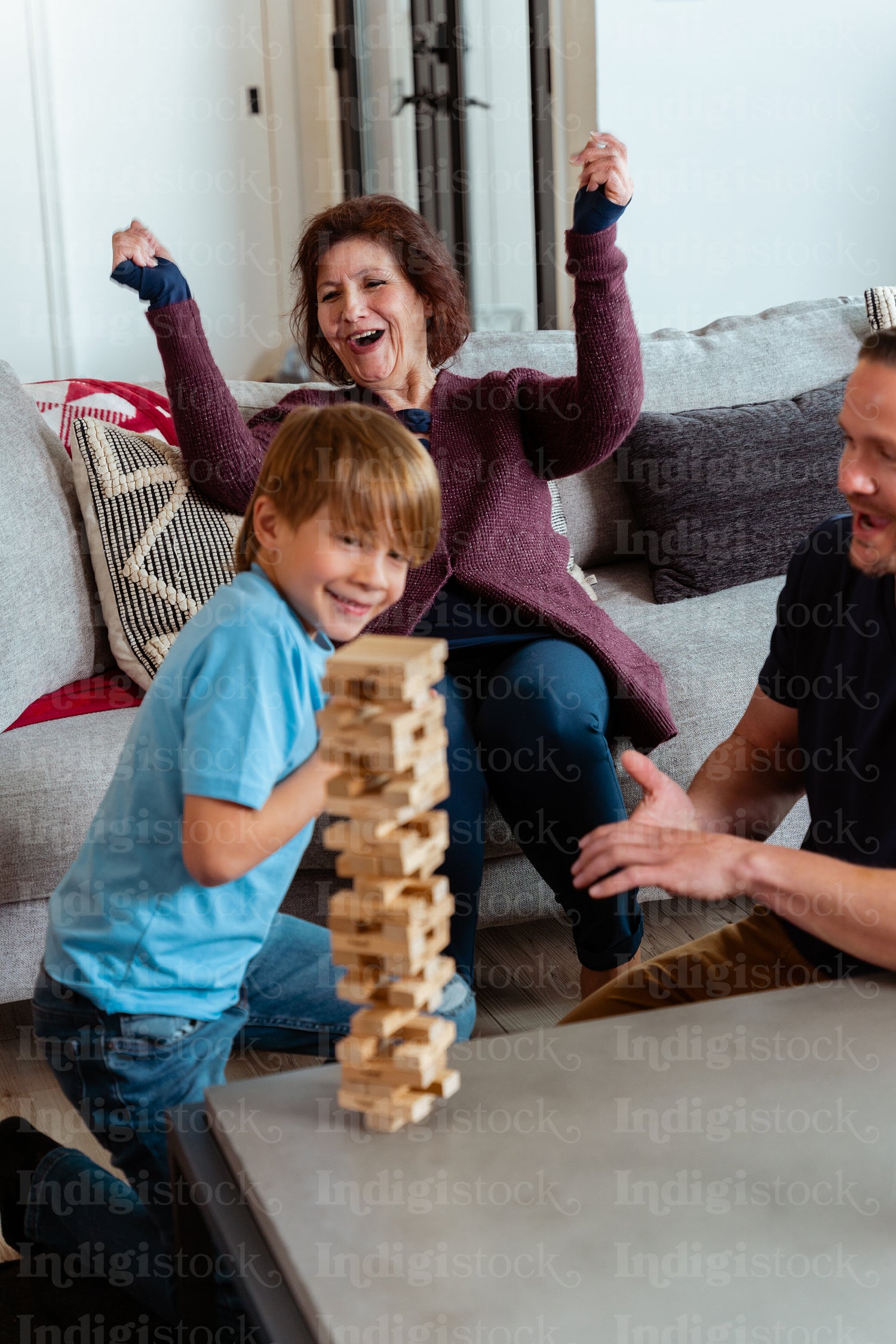 A family of Indigenous Peoples playing games together