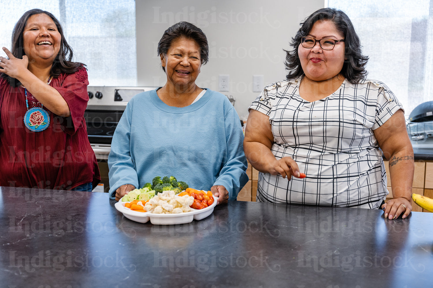 Native Peoples participating in a cooking class