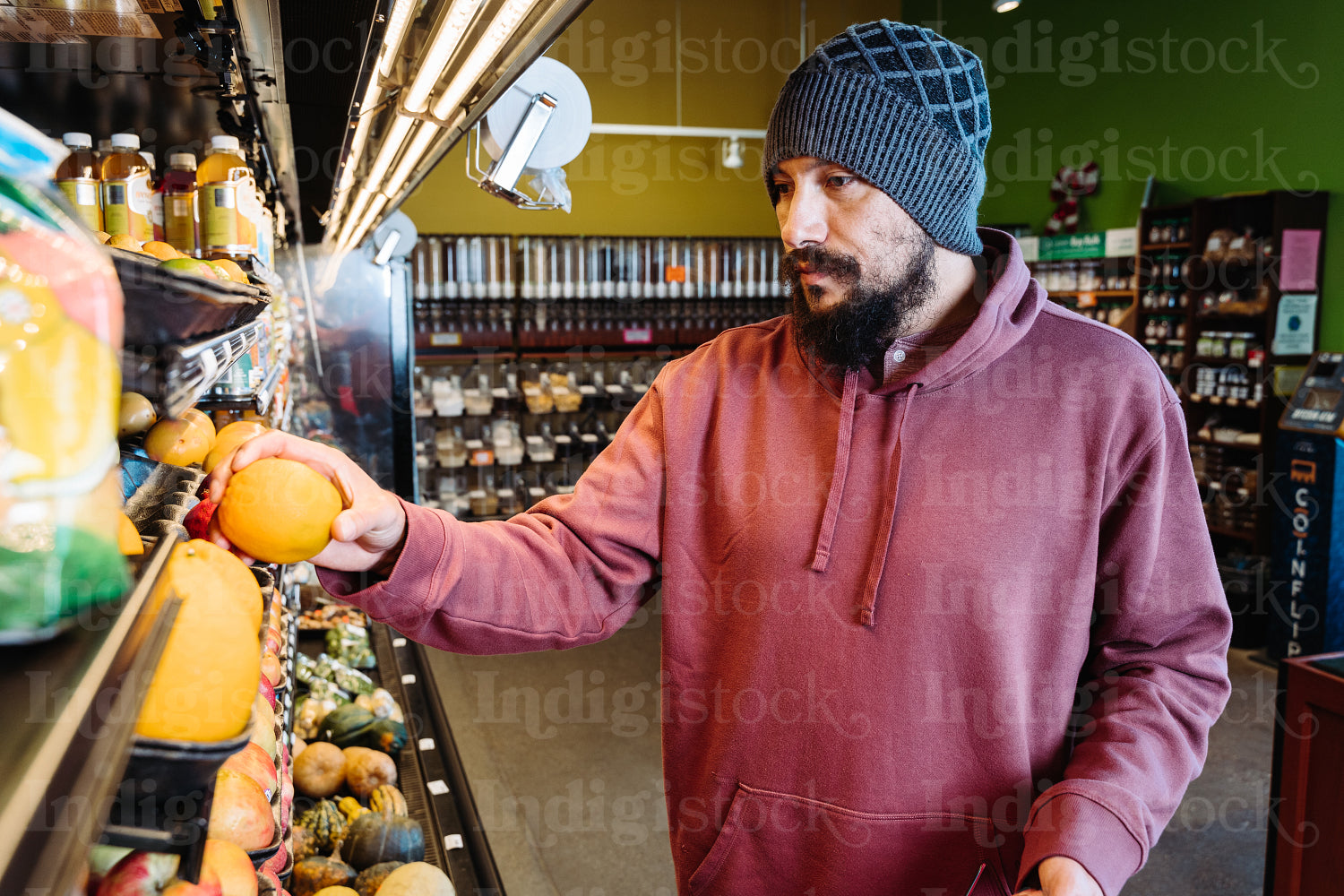 Indigenous man grocery shopping