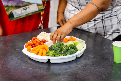 Native Peoples participating in a cooking class