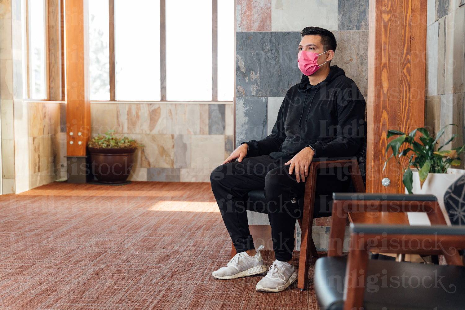 Indigenous man waiting in clinic