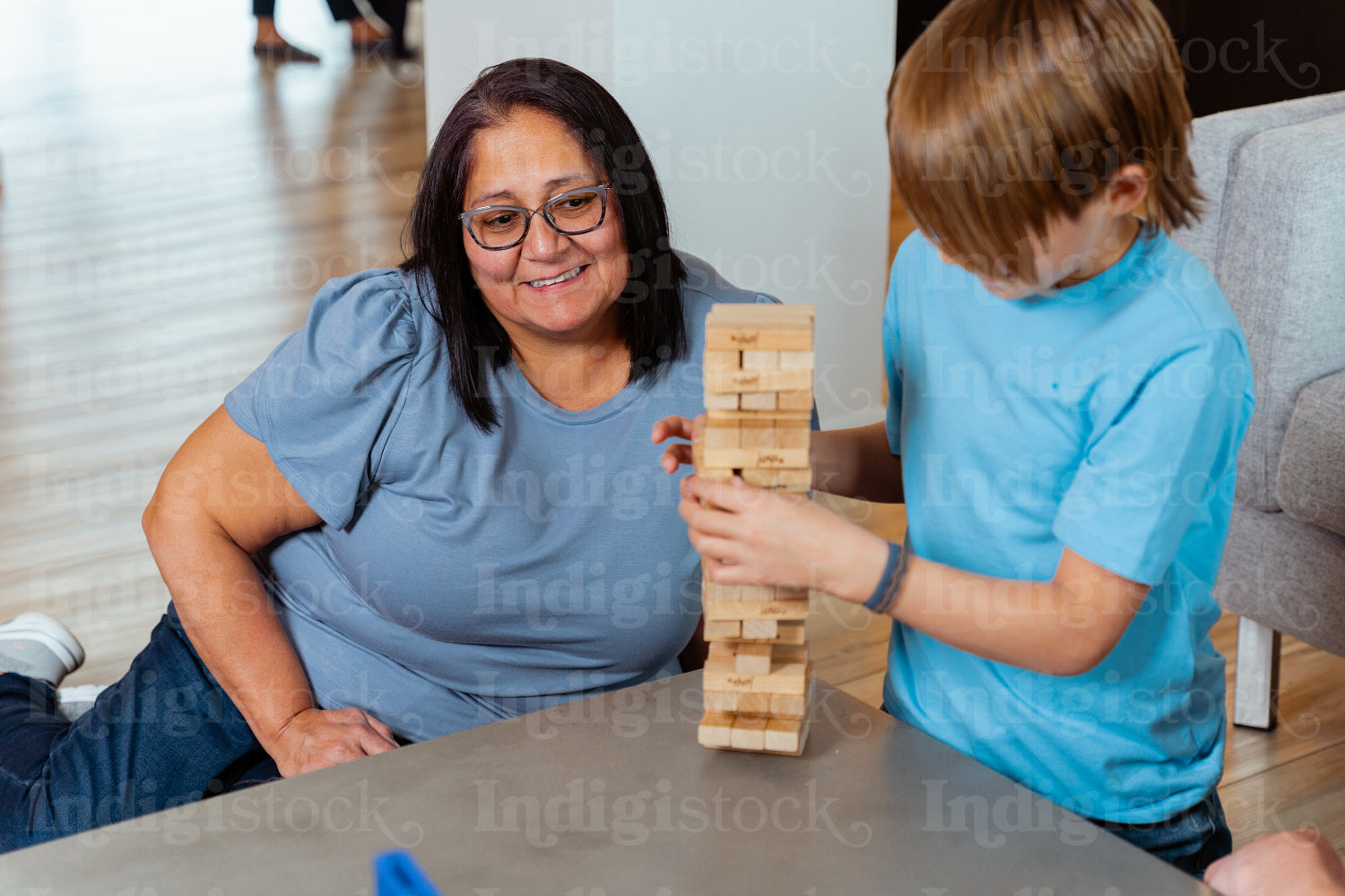 A family of Indigenous Peoples playing games together