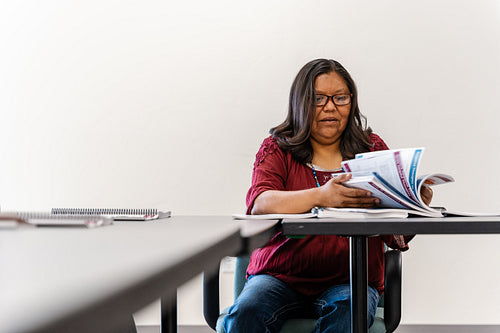 A Native woman learning about health and wellbeing