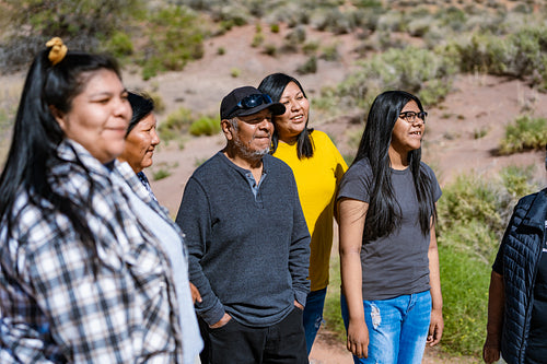 A Native family walking together