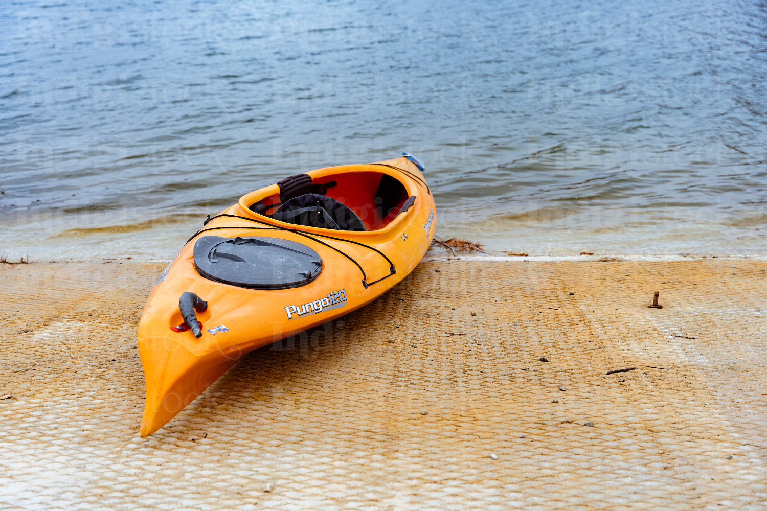 Indigenous family going kayaking 