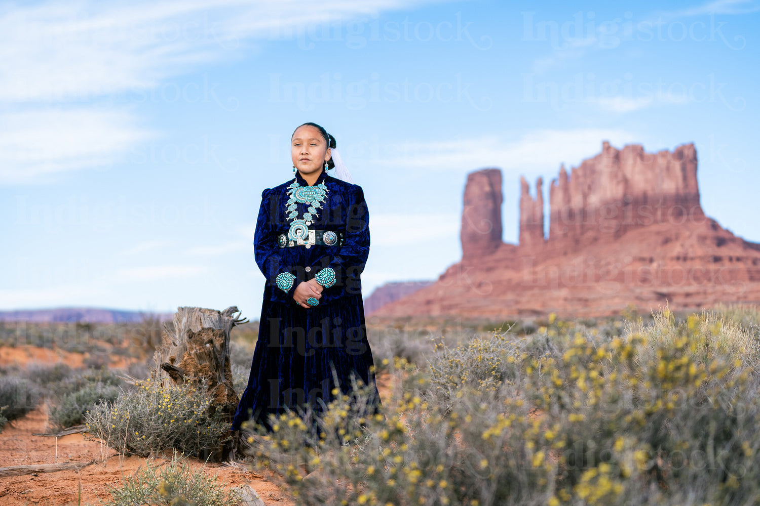 Native youth wearing traditional clothing and regalia 