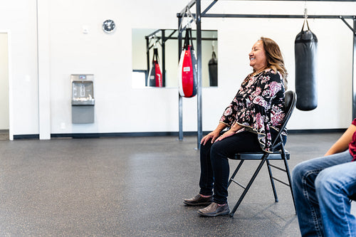 Native woman learning from an instructor