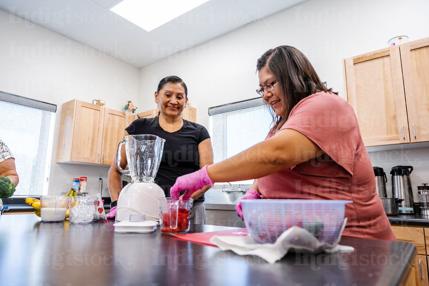 Native Peoples participating in a cooking class