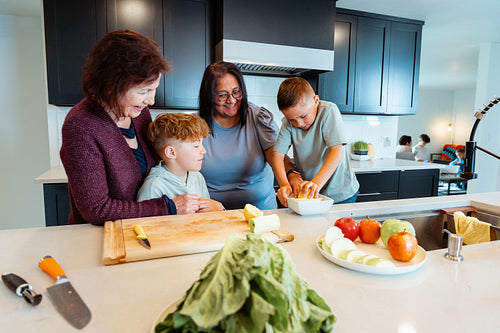 A Native family is preparing a meal together