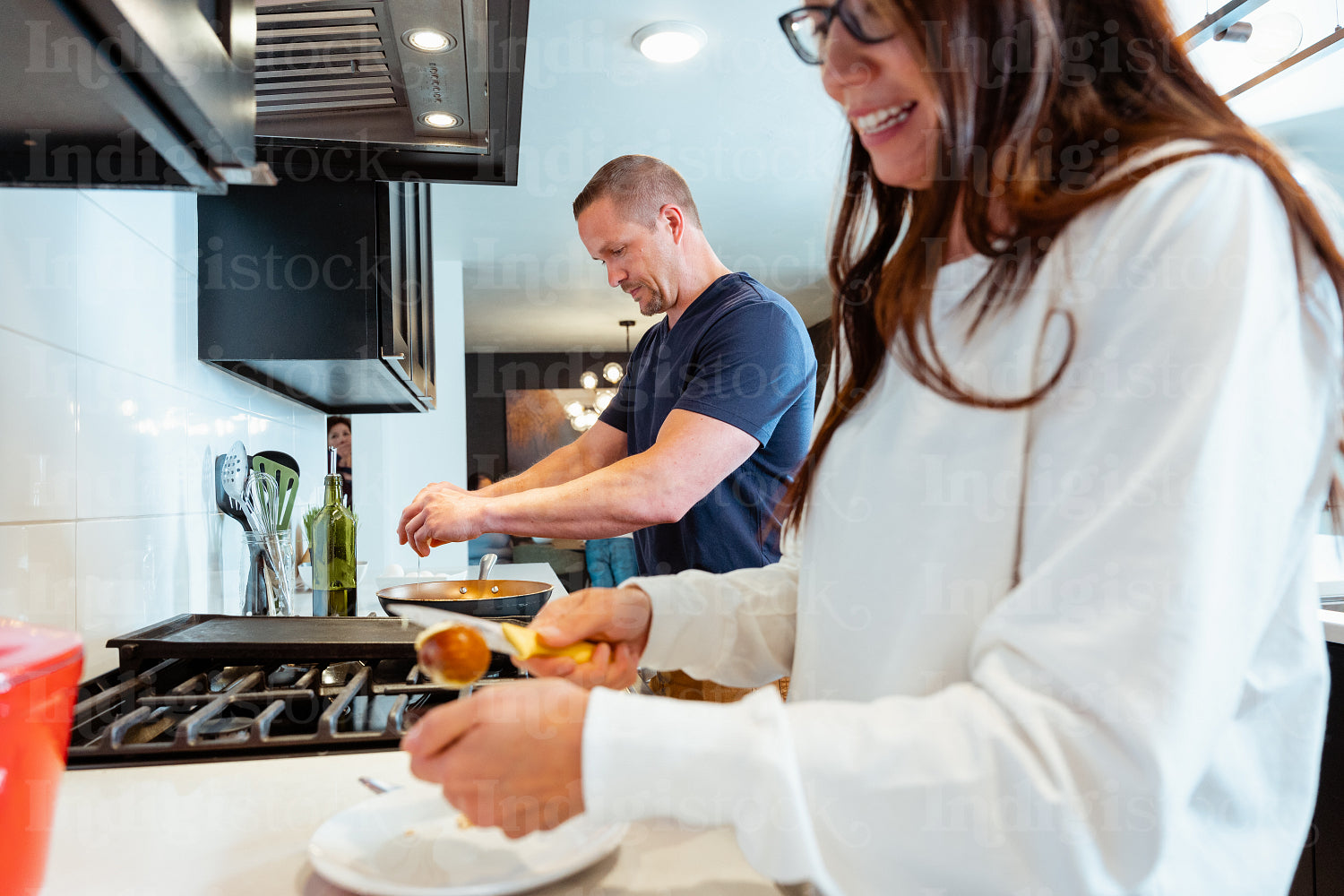 A couple cooking a meal together