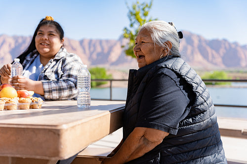 Indigenous family enjoying a park outside togather