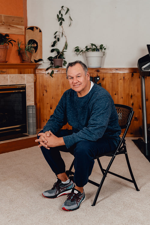 Indigenous Men working out in home gym