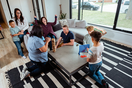 A family of Indigenous Peoples playing games together