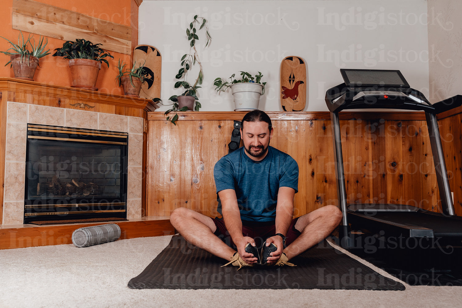 Indigenous Men working out in home gym