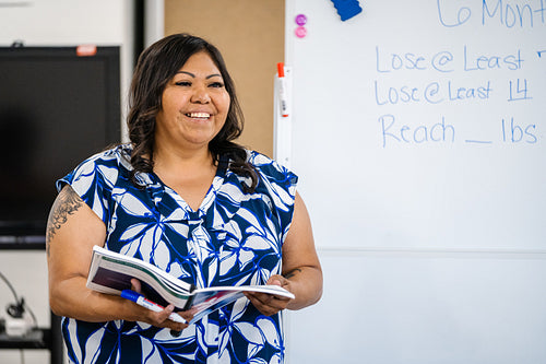 A Native teacher instructing a class about health and wellness