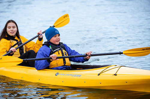 Indigenous family going kayaking