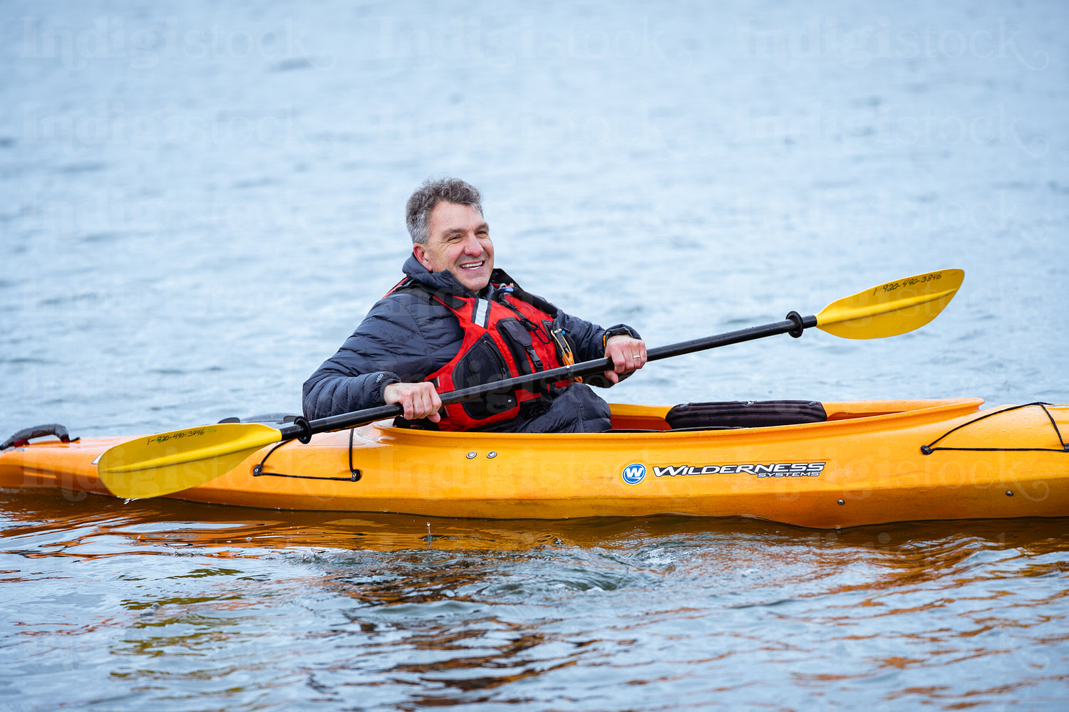 Indigenous family going kayaking 