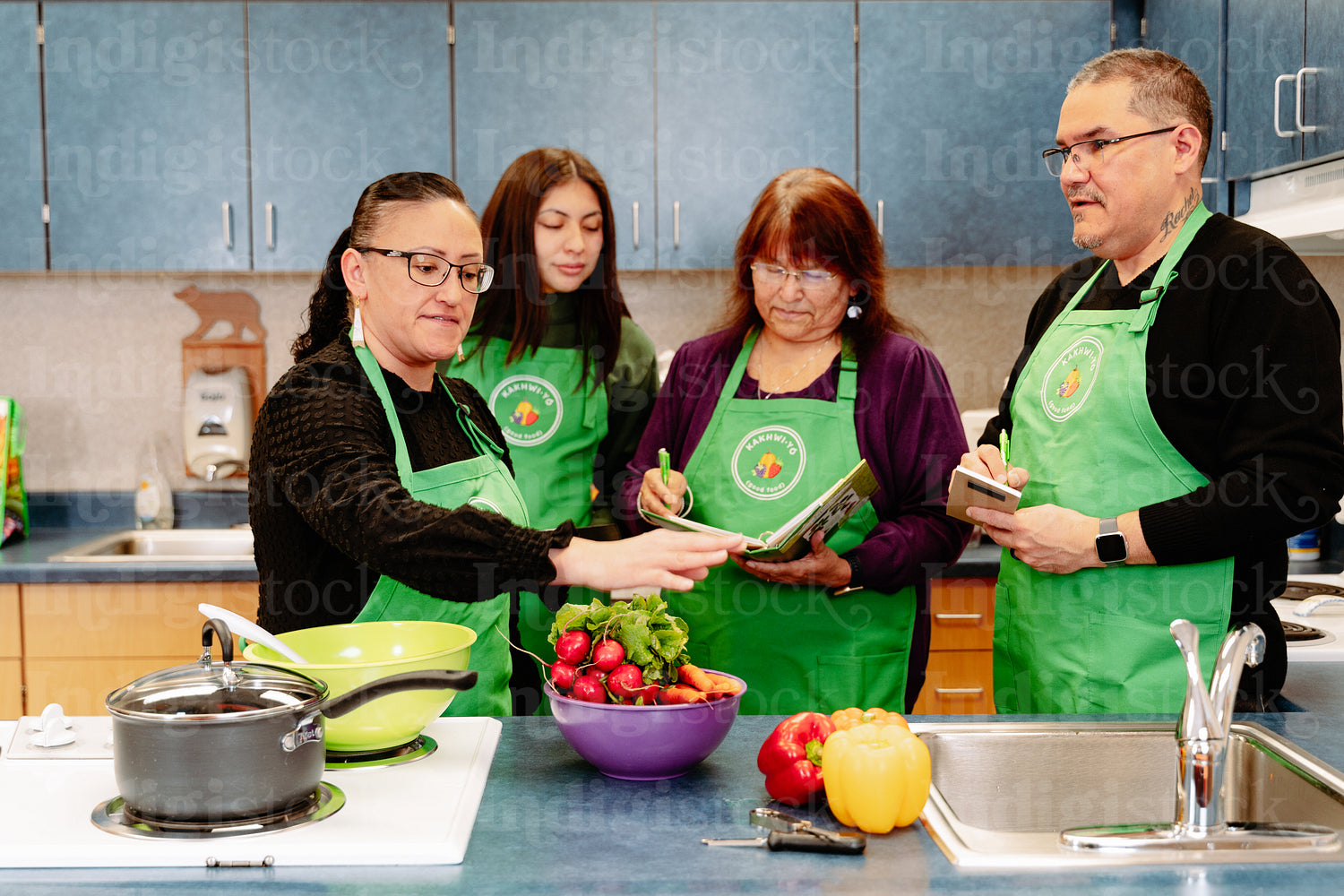 Indigenous Peoples making a meal together