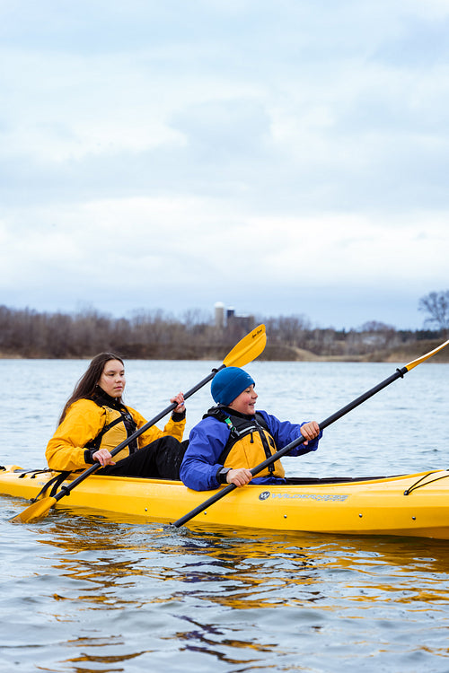 Indigenous family going kayaking