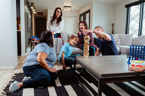 A family of Indigenous Peoples playing games together