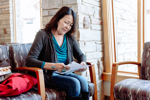 Indigenous woman waiting in a clinic