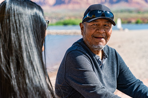 Native Elder enjoying a walk by a lake