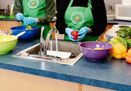 Indigenous Peoples making a meal together