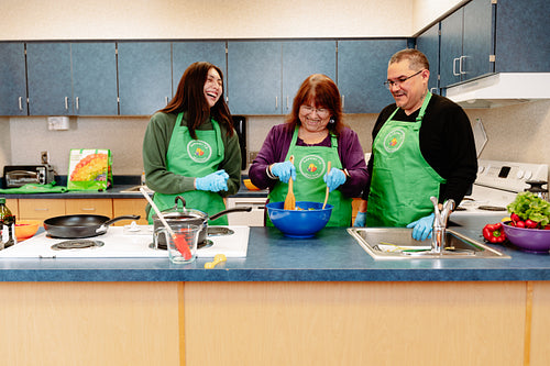 Indigenous Peoples making a meal together